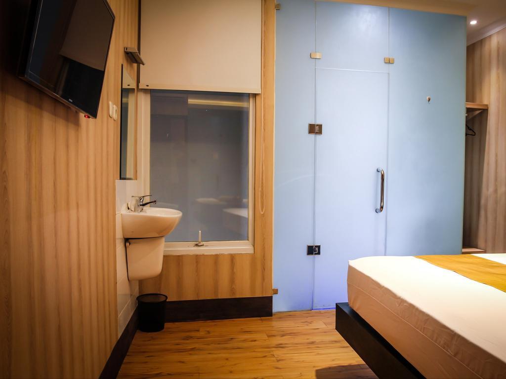 Madu Inn Τζακάρτα Δωμάτιο φωτογραφία